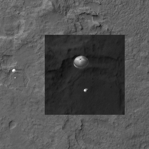 NASA’s Mars Science Laboratory, Curiosity, was spotted by HiRISE as it descended to the surface on Aug. 5, 2012. Curiosity and its parachute are on the left, while above is a close-up, stretched to avoid saturation. The rover is landing on the etched plains just north of the sand dunes that fringe Aeolis Mons (informally called Mount Sharp) within Gale Crater. Details in the parachute such as the band gap at the edges and the central hole are clearly visible. NASA’s Mars Science Laboratory, Curiosity, was spotted by HiRISE as it descended to the surface on Aug. 5, 2012. Curiosity and its parachute are on the left, while above is a close-up, stretched to avoid saturation. The rover is landing on the etched plains just north of the sand dunes that fringe Aeolis Mons (informally called Mount Sharp) within Gale Crater. Details in the parachute such as the band gap at the edges and the central hole are clearly visible.